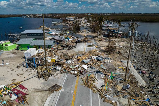 PHOTO: An aerial view shows a broken section of the Pine Island Road, debris and destroyed houses in the aftermath of Hurricane Ian in Matlacha, Fla., Oct. 1, 2022.  (Ricardo Arduengo/AFP via Getty Images)