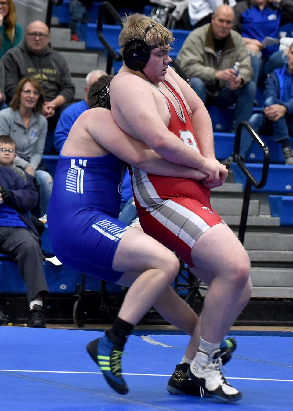 Aiden Massingill of Dundee holds onto Chase Norbury of Bedford in the 285 pound match. Norbury won the match 2-0 at Dundee High School Wednesday, Jan. 31, 2024. The Vikings won the dual 61-3.