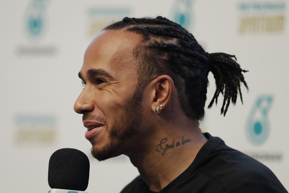 Mercedes' driver Lewis Hamilton, of Britain, smiles during a news conference in Sao Paulo, Brazil, Wednesday, Nov. 13, 2019. The Brazilian F1 GP will take place on NOv. 17. (AP Photo/Nelson Antoine)