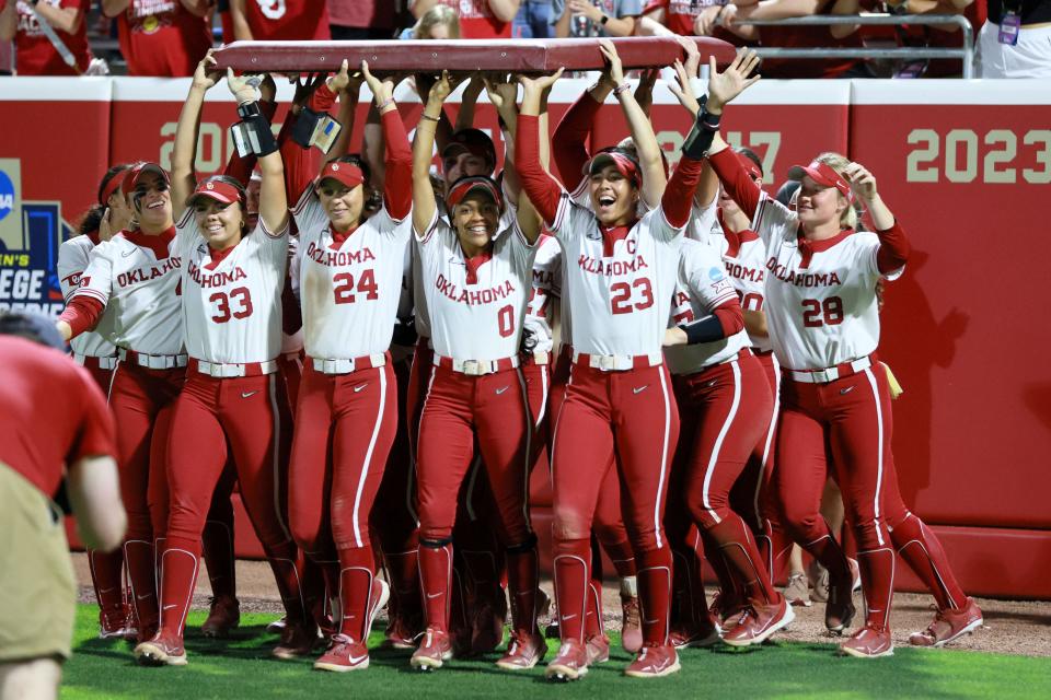 Oklahoma players celebrate after a softball game between the Oklahoma Sooners (OU) and the Florida State Seminoles in Game 2 of the Norman Super Regional in the NCAA Tournament at Love's Field, Friday, May 24, 2024. Oklahoma won 4-2 to advance to the Women's College World Series.