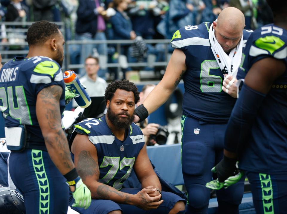 Should the NFL expect more players to join Michael Bennett and others by kneeling during the national anthem? (Getty)