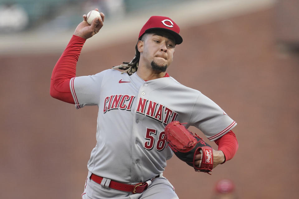 Cincinnati Reds pitcher Luis Castillo throws to a San Francisco Giants batter during the first inning of a baseball game in San Francisco, Tuesday, April 13, 2021. (AP Photo/Jeff Chiu)