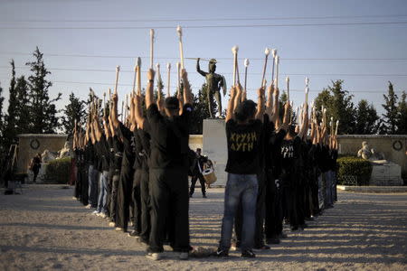 Golden dawn supporters rehearse for a ceremony in Thermopylae, outside Athens, Greece, September 5, 2015. REUTERS/Fotis Plegas G.