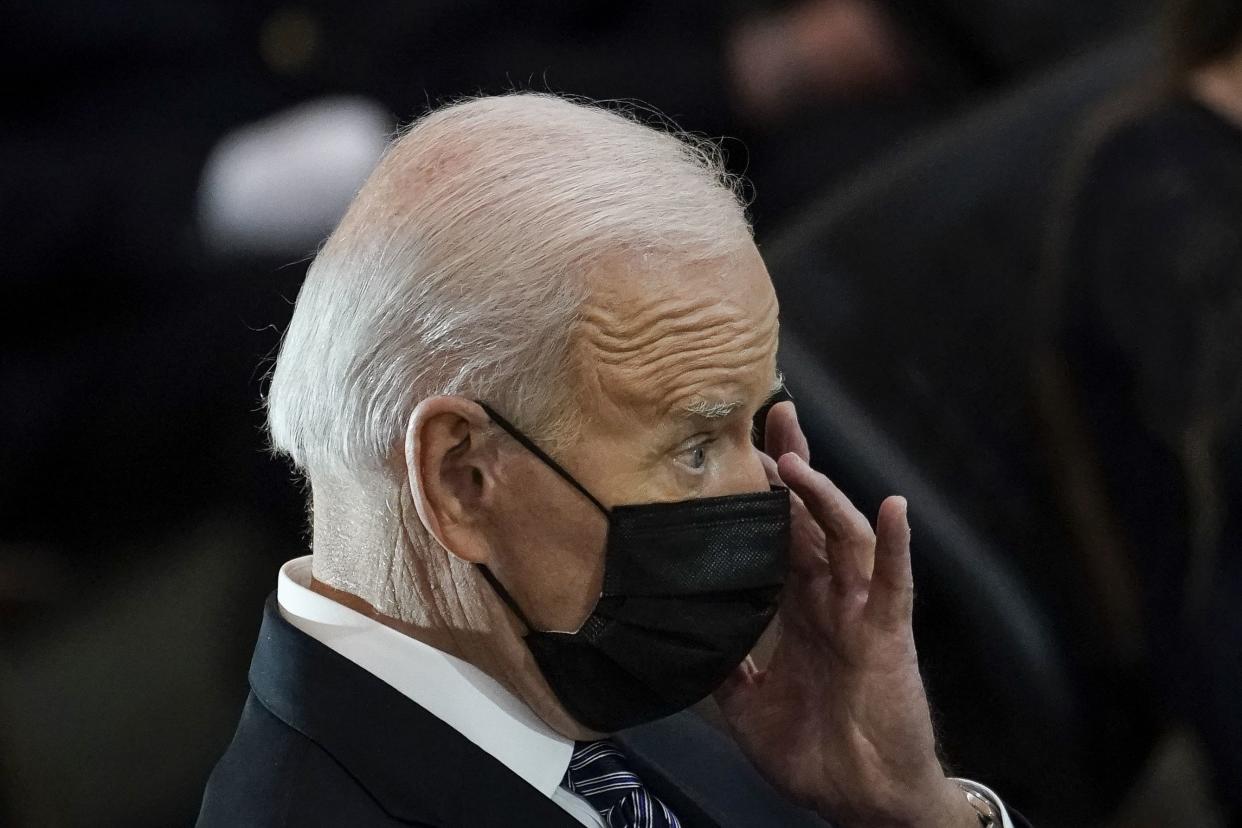 President Joe Biden rubs his eye during a memorial for the late U.S. Capitol Police officer William "Billy" Evans as he lies in honor in the Rotunda at the U.S. Capitol on April 13, 2021 in Washington, DC.