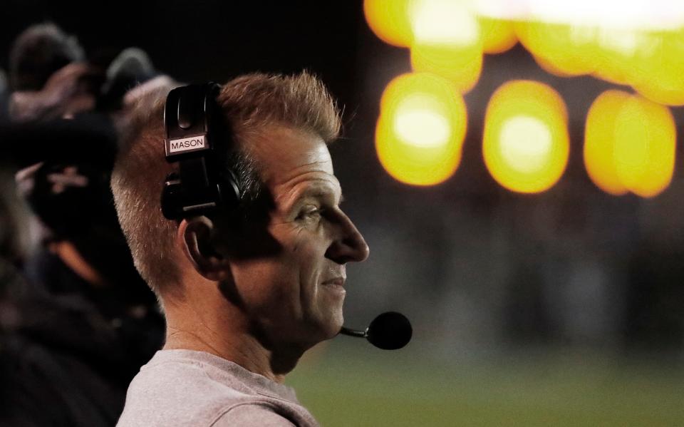Central Valley Christian's Head Coach Mason Hughes on the sidelines against Lemoore during their Central Section Division II high school football championship playoff game in Visalia, Calif., Friday, Nov. 24, 2023.