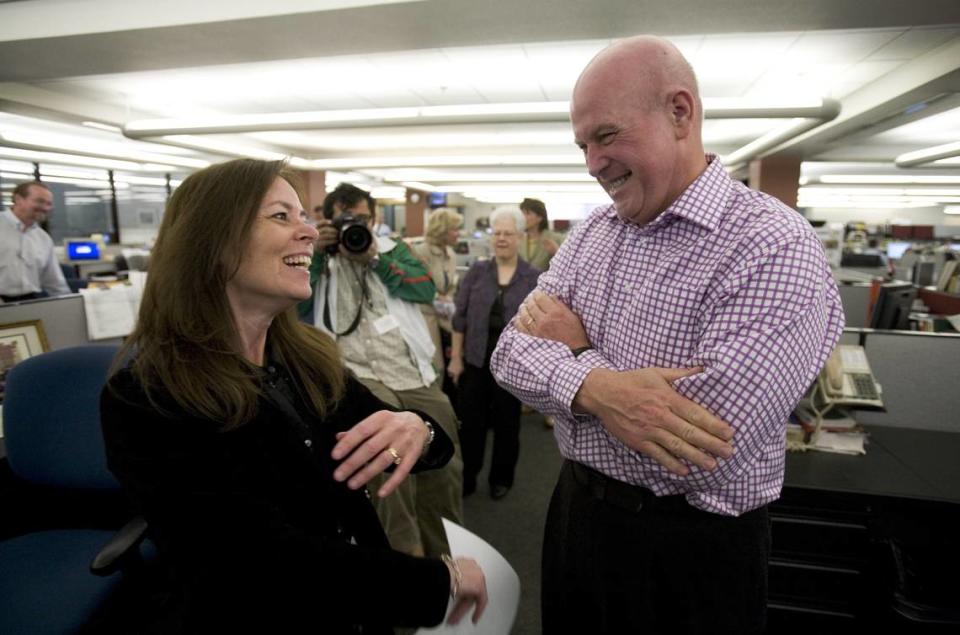 McClatchy Vice President of News Howard Weaver chats with Sacramento Bee visual journalist Renée C. Byer in 2007, after the announcement that Byer had won the Pulitzer Prize for feature photography. Weaver, an Alaska native and former vice president of news for Sacramento Bee parent McClatchy, died Thursday at the age of 73.