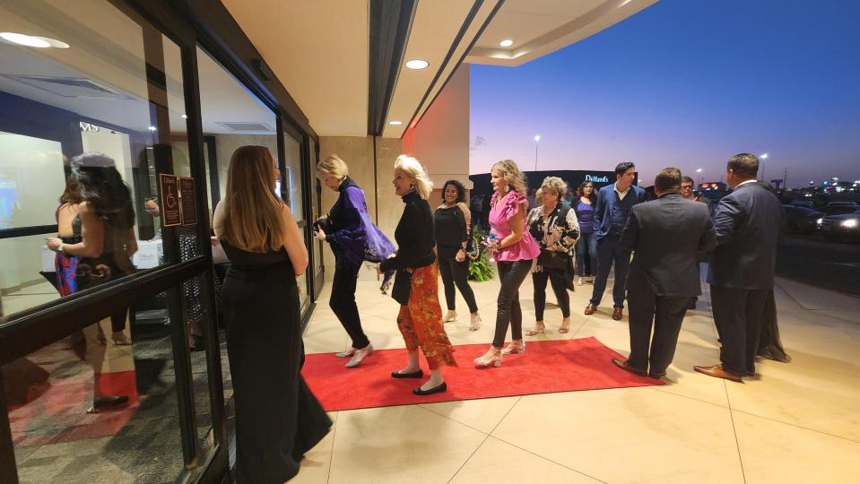 A crowd lines up outside of Dillard's Wednesday night at its  Grand Opening Fashion Gala at the Westgate Mall in Amarillo.