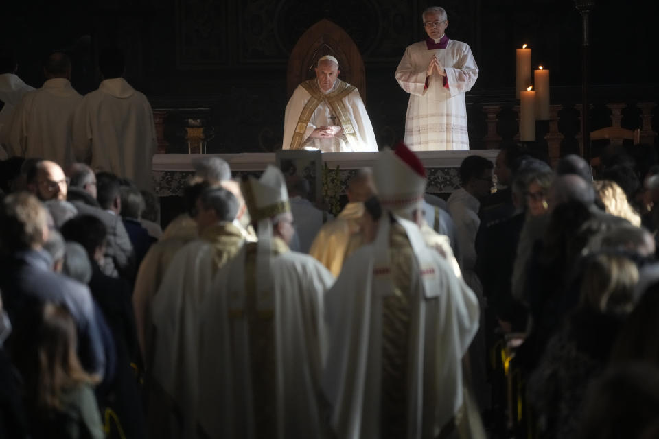 Pope Francis presides over the holy mass in the Cathedral of Asti, northern Italy, Sunday, Nov. 20, 2022, to meet the diocesan community from which his parents had left to emigrate to Argentina and the young people from all over the region on the occasion of the XXXVII World Youth Day. (AP Photo/Gregorio Borgia)