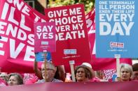 Pro "assisted dying" campaigners protest outside the Houses of Parliament in central London, Britain September 11, 2015. REUTERS/Stefan Wermuth