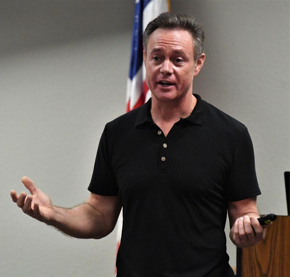 Cold case investigator Paul Holes speaks to an audience inside the Wichita Falls Police Department Training Facility on Thursday, July 13, 2023.