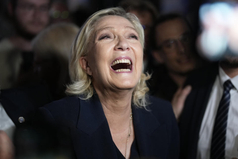 French far right leader Marine Le Pen reacts as she meets supporters and journalists after the release of projections based on the actual vote count in select constituencies , Sunday, June 30, 2024 in Henin-Beaumont, northern France. French voters propelled the far-right National Rally to a strong lead in first-round legislative elections Sunday and plunged the country into political uncertainty, according to polling projections. (AP Photo/Thibault Camus)