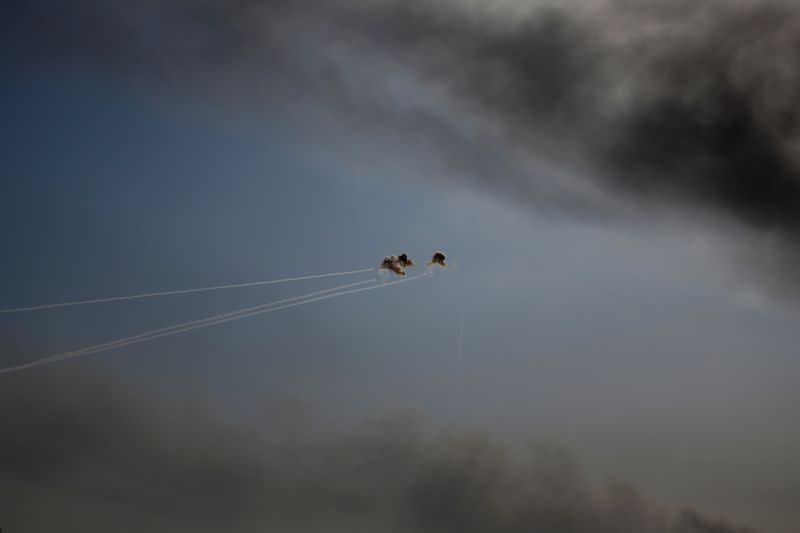 Israel's Iron Dome anti-missile system intercepts rockets launched from the Gaza Strip, amid the ongoing conflict between Israel and the Palestinian Islamist group Hamas, as seen from southern Israel