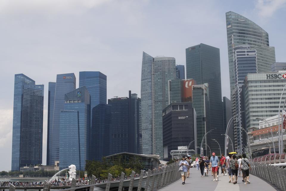 SINGAPORE – JULY 21: A view of the DBS bank headquarters (2nd from left), the Standard Chartered corporate headquarters (3rd from left) and the HSBC bank building at the Marina Bay Financial Centre, Singapore, on July 21, 2019. (Photo by Adli Ghazali/Anadolu Agency via Getty Images)