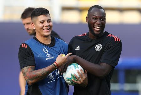 Soccer Football - Manchester United Training - Skopje, Macedonia - August 7, 2017 Manchester United's Romelu Lukaku and Marcos Rojo during training REUTERS/Eddie Keogh