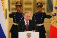 Russian President Vladimir Putin speaks during a personal send-off for members of the Russian Olympic team at the Kremlin in Moscow, Russia, July 27, 2016. REUTERS/Maxim Shemetov