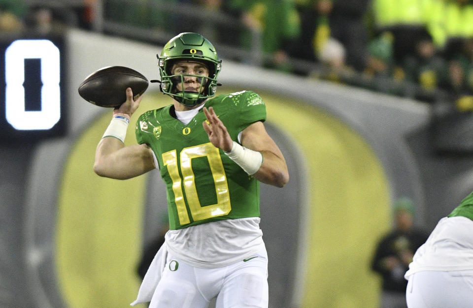 Oregon quarterback Bo Nix throws a pass against Oregon State during the second half of an NCAA college football game Saturday, Nov. 24, 2023, in Eugene, Ore. Oregon won 31-7. (AP Photo/Mark Ylen)