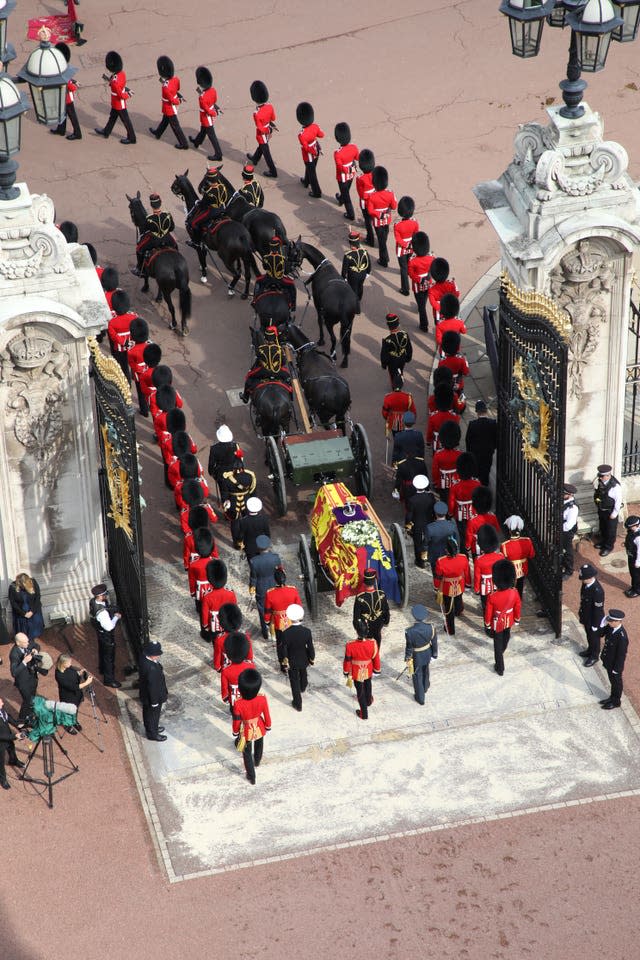 The coffin of the Queen  draped in the Royal Standard