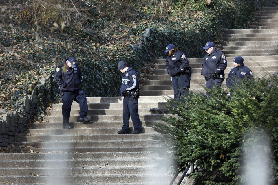 Law enforcement officers search Morningside Park along Manhattan's Upper West Side, Thursday, Dec. 12, 2019, in New York. An 18-year-old Barnard College freshman, identified as Tessa Majors, has been fatally stabbed during an armed robbery in the park, sending shock waves through the college and wider Columbia University community. (AP Photo/Richard Drew)