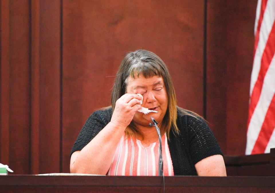 Chandra Murphey wipes her tears while giving her testimony about her mother in law, Charlene Murphey during the trial of RaDonda Vaught, a former Vanderbilt nurse charged with in the death of a patient, at Justice A.A. Birch Building in Nashville, Tenn., Tuesday, March 22, 2022. 