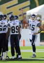 Toronto Argonauts' quarterback and former Edmonton Eskimo Ricky Ray salutes the crowd during the first half, CFL football action in Edmonton, Alta., Saturday, June 30, 2012. THE CANADIAN PRESS/John Ulan