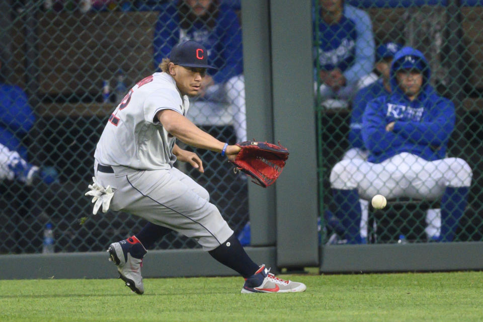 Cleveland Indians left fielder Josh Naylor fields a single by Kansas City Royals' Whit Merrifield during the first inning of a baseball game Monday, May 3, 2021, in Kansas City, Mo. (AP Photo/Reed Hoffmann)