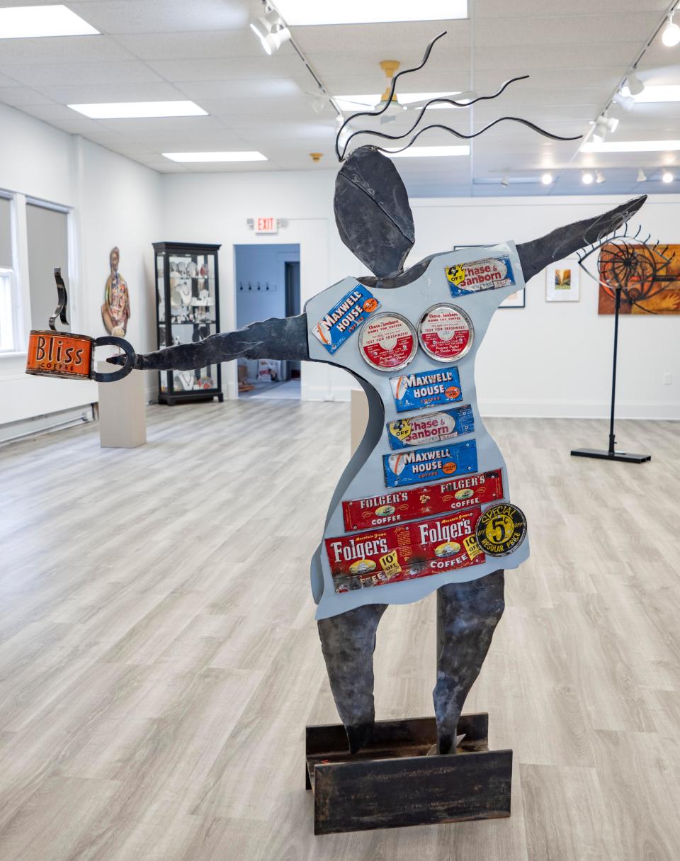 Artist Linda Gaynor of Sylvania, Ohio, created this forged and welded steel and found objects piece, which has been part of the Adrian Center for the Arts' "Risk" juried art show. Various coffee companies including Chase and Sanborn, Folgers and Maxwell House are featured.