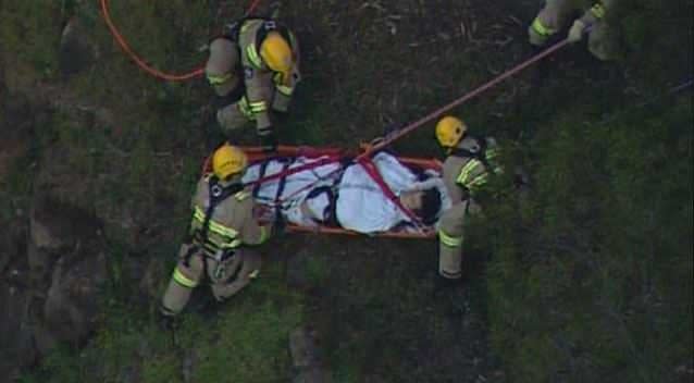 Delicate operation to rescue teenager who fell down a steep embankment in North Fitzroy. Photo: 7News