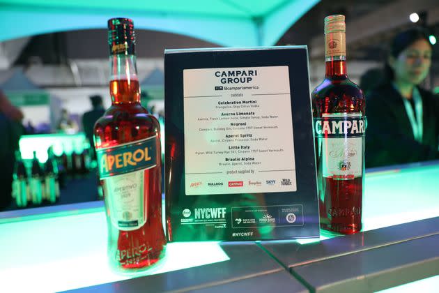 You're very unlikely to notice the difference in flavor between Aperol and Campari. (Photo: Monica Schipper via Getty Images)