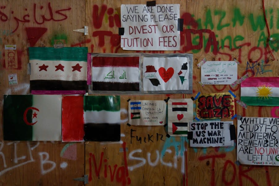 LOS ANGELES, CALIFORNIA – MAY 1: Signs supporting Pro-Palestinian protestors are seen in an encampment at the University of California, Los Angeles (UCLA) campus on May 1, 2024 in Los Angeles, California. The camp was declared ‘unlawful’ by the university and many protestors have been detained. Pro-Palestinian encampments have sprung up at college campuses around the country with some protestors calling for schools to divest from Israeli interests amid the ongoing war in Gaza. (Photo by Eric Thayer/Getty Images)