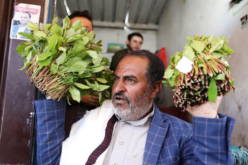 Vendor shows qat, a mild stimulant, at a qat market amid concerns of the spread of the coronavirus disease (COVID-19) in Sanaa
