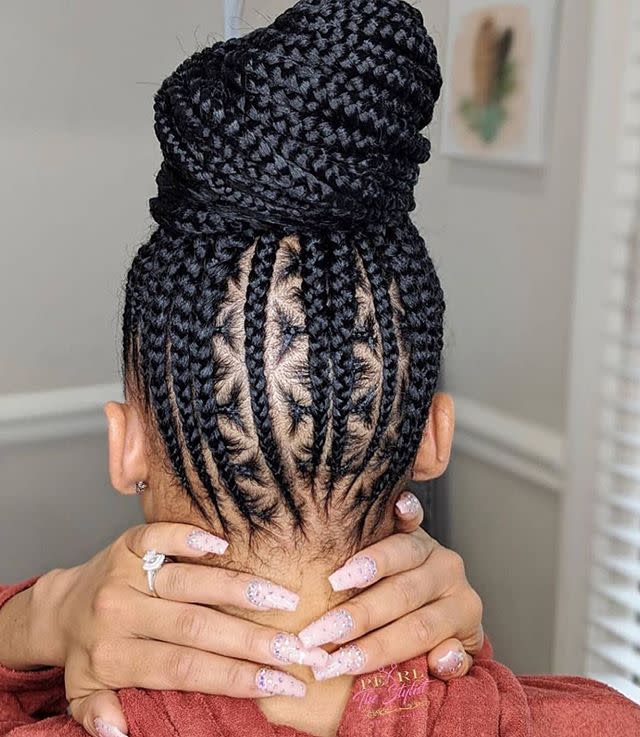 <p>A twist on traditional cornrows, to get this look start braiding at the nape of your neck and work your way upwards to a top knot. The effect is so cool.</p><p><a href="https://www.instagram.com/p/B58fSTQg6_x/" rel="nofollow noopener" target="_blank" data-ylk="slk:See the original post on Instagram;elm:context_link;itc:0;sec:content-canvas" class="link ">See the original post on Instagram</a></p>