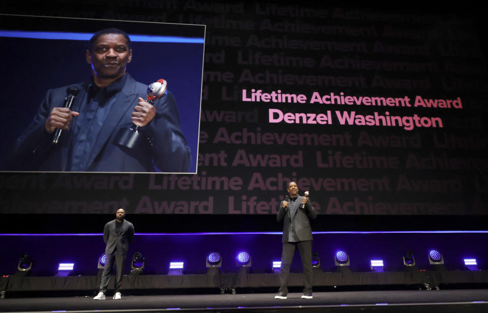 Denzel Washington accepts the Lifetime Achievement Award during opening night of CinemaCon.