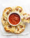 <p>When cheesy stuffed crust invites mini meatballs to the party, magic happens.</p><p><em><a href="http://pinchofyum.com/pull-apart-pizza-ring#easyrecipe-31620-0" rel="nofollow noopener" target="_blank" data-ylk="slk:Get the recipe from Pinch of Yum »;elm:context_link;itc:0;sec:content-canvas" class="link "><span class="redactor-invisible-space">Get the recipe from Pinch of Yum »</span> </a></em></p>