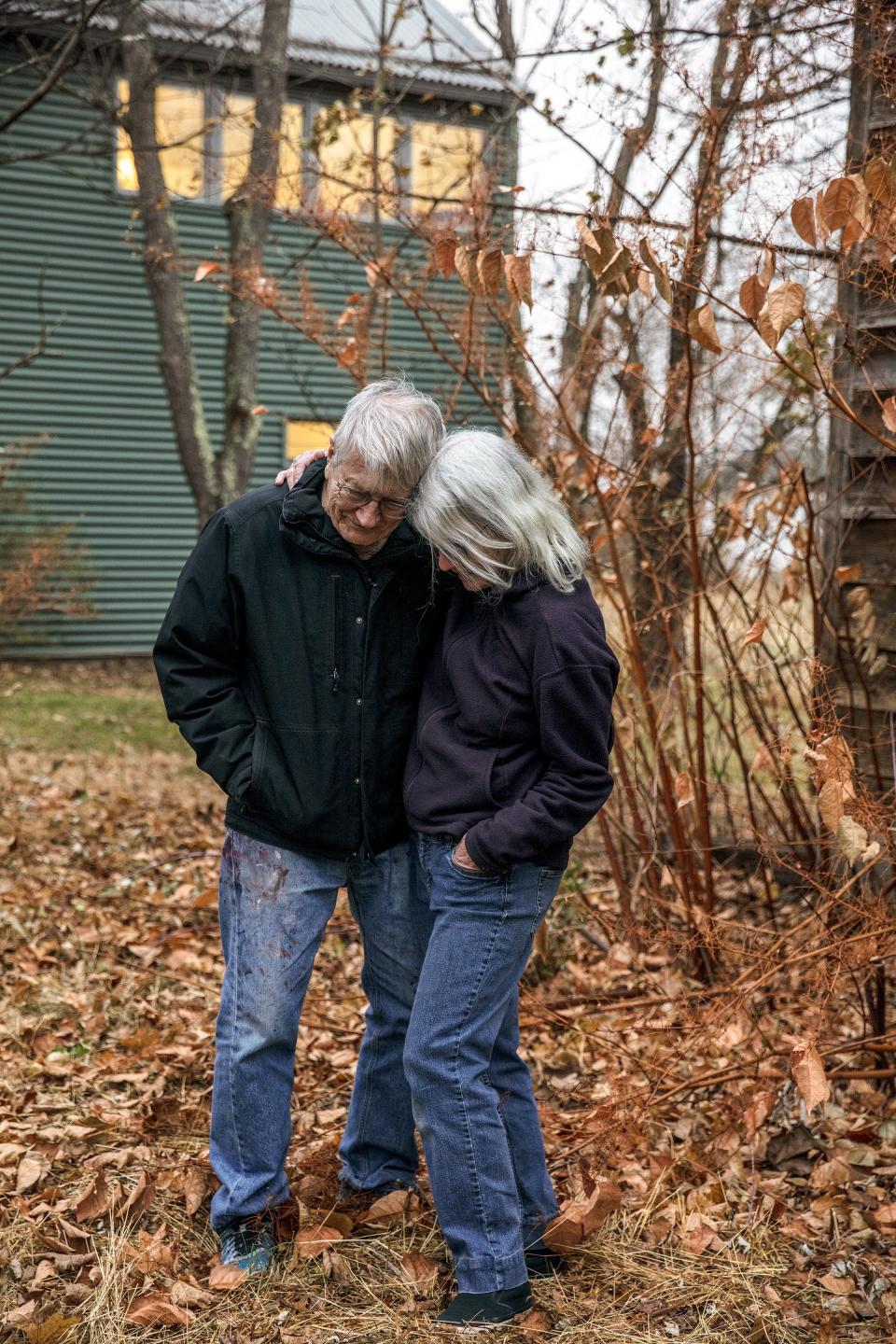 Saul and his wife, the ceramic artist Sally Saul, outside their home, where the couple also have studios.