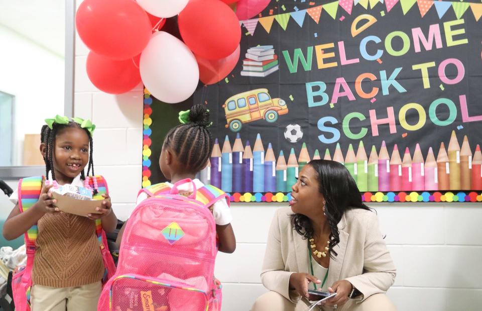 SCCPSS Superintendent Denise Watts talks with young Bloomingdale Elementary School students during their first day of school on Thursday, August 3, 2023 at New Hampstead K-8.