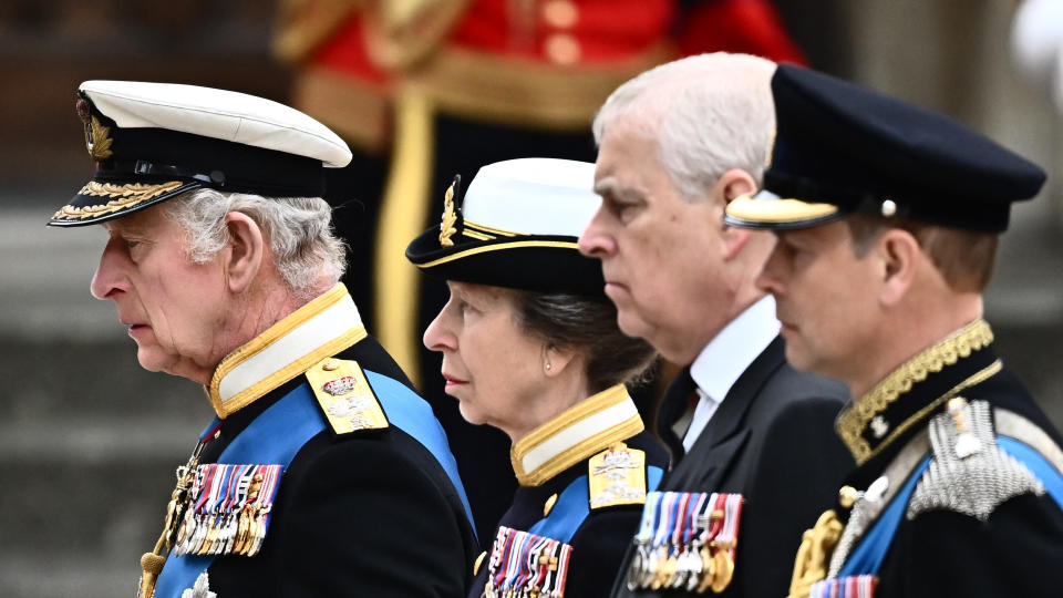 <p>King Charles III, the Princess Royal, the Duke of York and the Earl of Wessex in procession behind their mother, the Queen's, coffin ahead of her funeral at Westminster Abbey. (AFP via Getty Images)</p> 