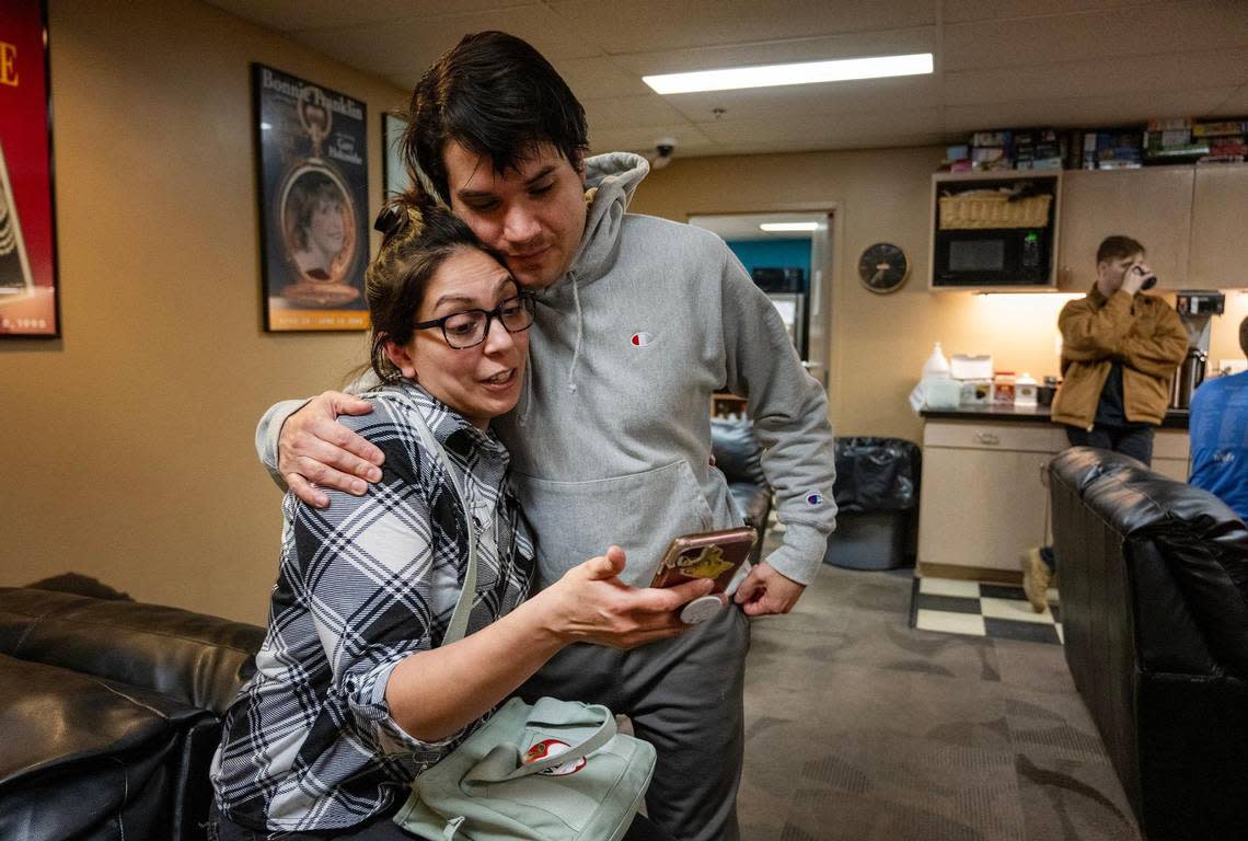Company manager Jenny O’Leary gets a hug from Victor Trevino Jr. when he arrives backstage about an hour before showtime for “Elvis: Aloha from Vegas” at New Theatre.