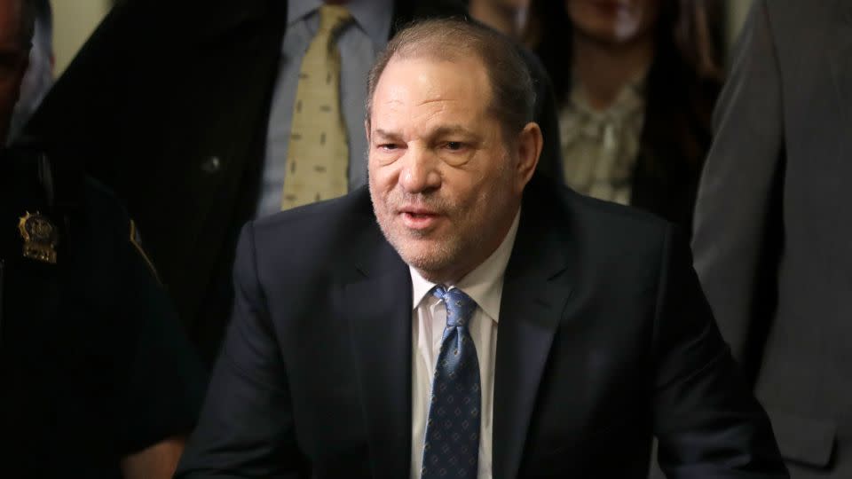 Harvey Weinstein arrives at a Manhattan courthouse for jury deliberations in February 2020. New York's highest court overturned his sex crimes conviction last week. - Seth Wenig/AP