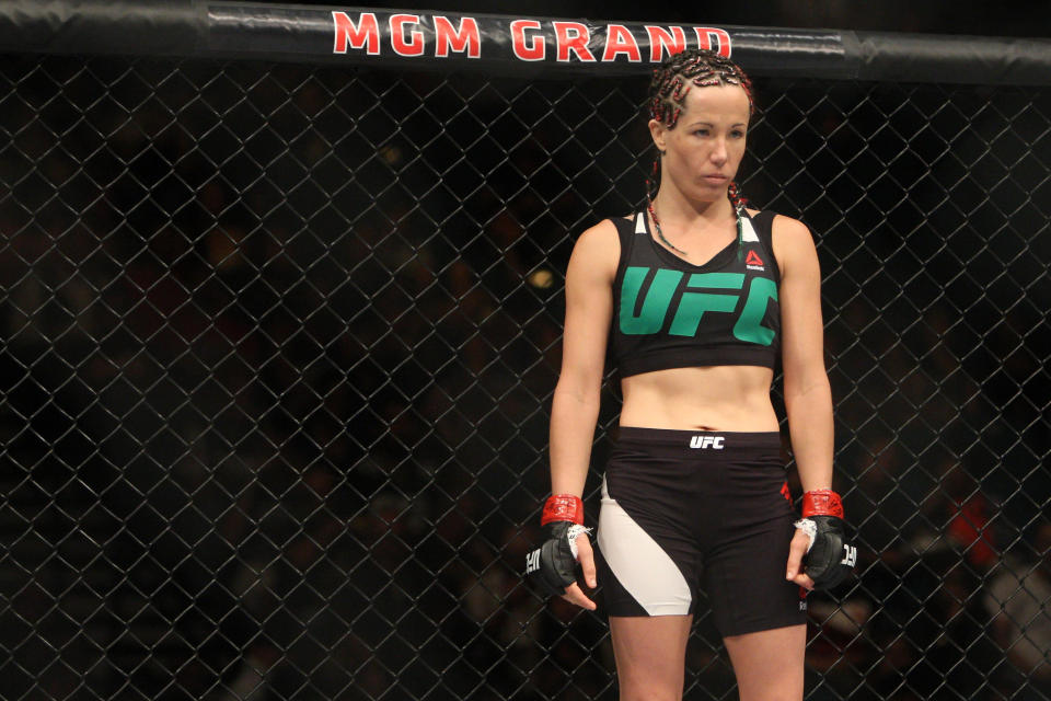 LAS VEGAS, NV - JULY 12:  Angela Magana enters the Octagon for her fight against Michelle Waterson in their women's strawweight bout during the Ultimate Fighter Finale inside MGM Grand Garden Arena on July 12, 2015 in Las Vegas, Nevada.  (Photo by Mitch Viquez/Zuffa LLC/Zuffa LLC via Getty Images)