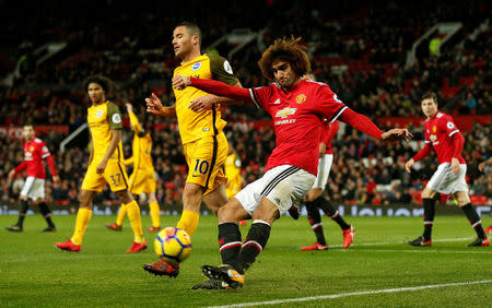 Soccer Football - Premier League - Manchester United vs Brighton & Hove Albion - Old Trafford, Manchester, Britain - November 25, 2017 Manchester United's Marouane Fellaini in action with Brighton's Tomer Hemed REUTERS/Andrew Yates