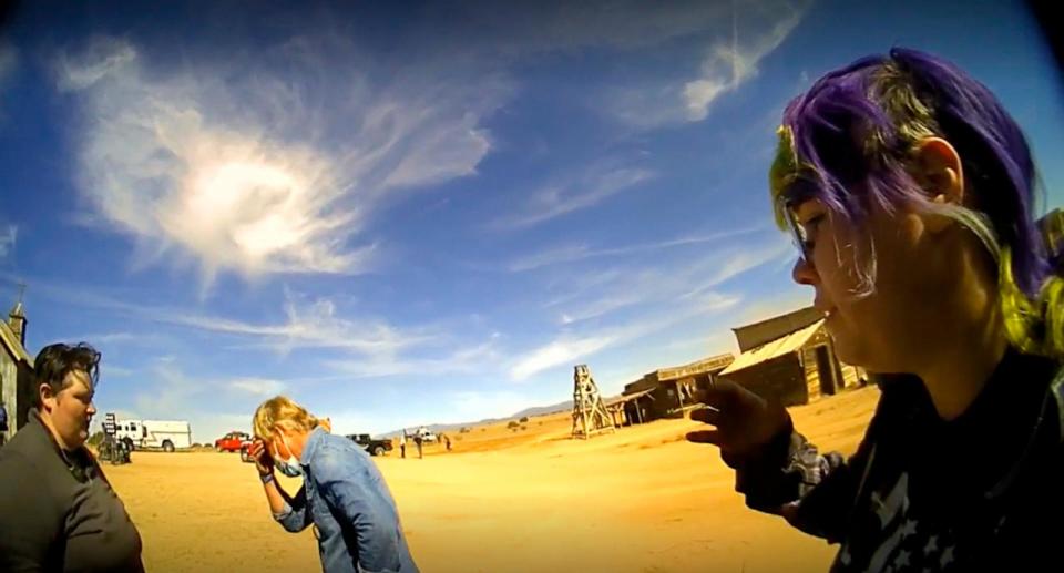 PHOTO: Movie set armorer Hannah Gutierrez-Reed, right, speaks with a sheriff's deputy on the set of the movie 'Rust,' shortly after the fatal shooting of cinematographer Halyna Hutchins by Alec Baldwin during a rehearsal, Oct. 21, 2021, in New Mexico.  (Santa Fe County Sheriff's Office via AP)