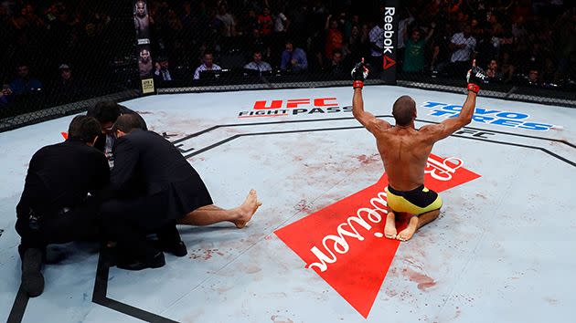 Barboza celebrates as trainers tend to Dariush. Image: Getty