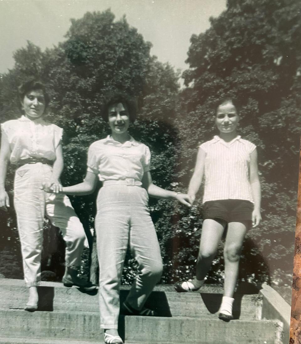 Maria Holzhauer (center) and Vincenza Miller (left) at Downing Park in Newburgh.