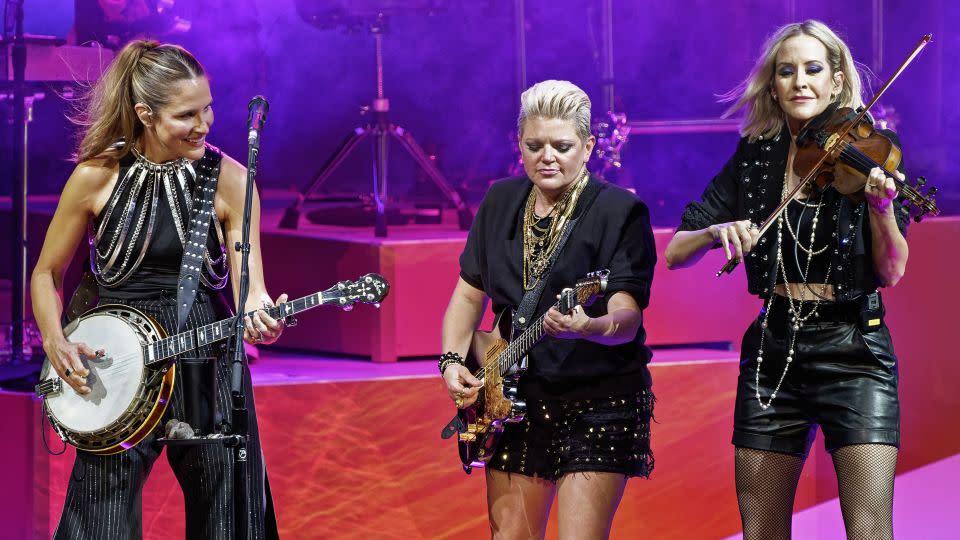 (From left) Emily Strayer, Natalie Maines, and Martie Maguire, of The Chicks, perform on Wednesday, June 15, 2022, at Hollywood Casino Amphitheatre in Tinley Park, Ill. - Rob Grabowski/Invision/AP