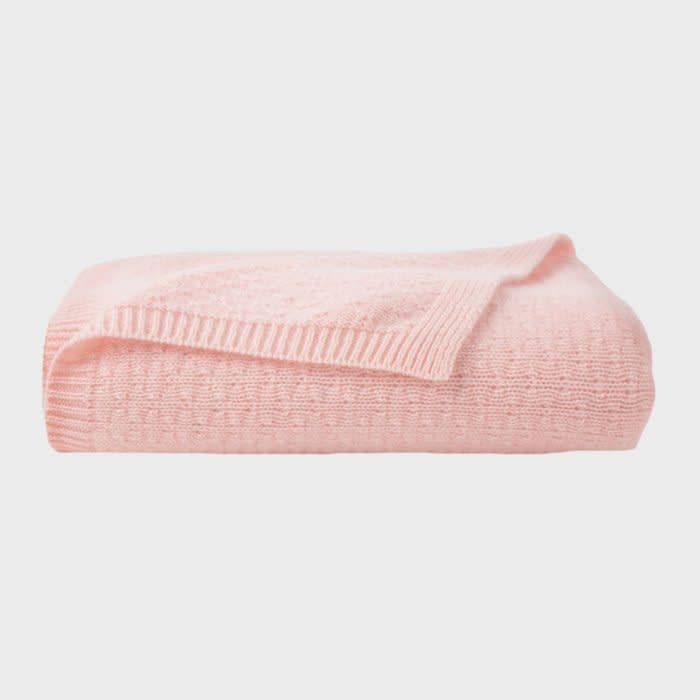 <a href="https://www.maisonette.com/product/tucked-stitch-cashmere-blanket-pink?" rel="nofollow noopener" target="_blank" data-ylk="slk:Lexi Ky Tucked Stitch Cashmere Blanket;elm:context_link;itc:0;sec:content-canvas" class="link rapid-noclick-resp">Lexi Ky Tucked Stitch Cashmere Blanket</a>