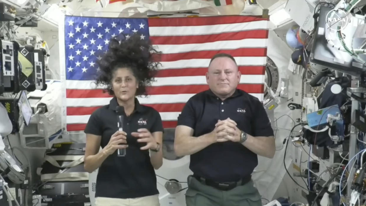 Astronauts Suni Williams and Butch Wilmore appear at a news conference aboard the International Space Station on July 10. (NASA via AP)