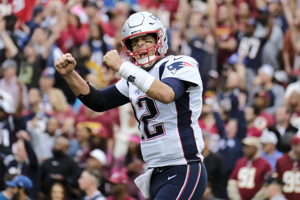 FILE - In this Oct. 6, 2019, file photo, New England Patriots quarterback Tom Brady (12) reacts to a touchdown against the Washington Redskins during the second half of an NFL football game in Washington. Brady, the centerpiece of the New England Patriots’ championship dynasty over the past two decades, appears poised to leave the only football home he has ever had. The 42-year-old six-time Super Bowl winner posted Tuesday, March 17, 2020, on social media “my football journey will take place elsewhere.” The comments were the first to indicate the most-decorated player in NFL history would leave New England. (AP Photo/Mark Tenally, File)