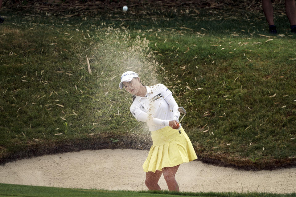 So Yeon Ryu, of South Korea, follows her ball after playing on the 5th hole during the Evian Championship women's golf tournament in Evian, eastern France, Saturday, July 23, 2022. (AP Photo/Laurent Cipriani)