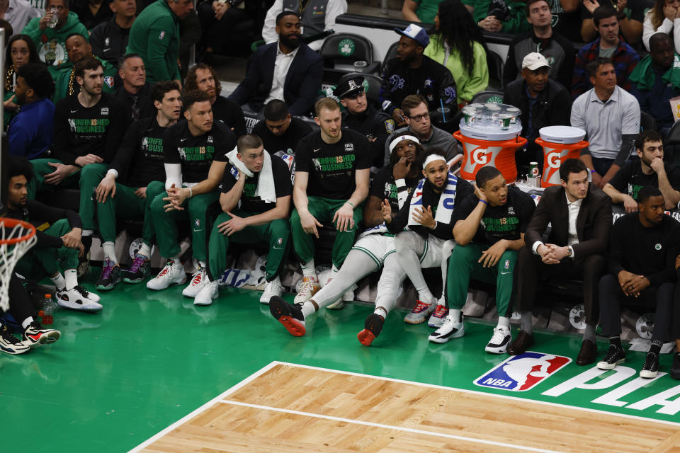 The Boston Celtics bench watches late in the second half of Game 1 of the NBA basketball Eastern Conference finals playoff series against the Miami Heat in Boston, Wednesday, May 17, 2023. The Heat won 123-116. (AP Photo/Michael Dwyer)