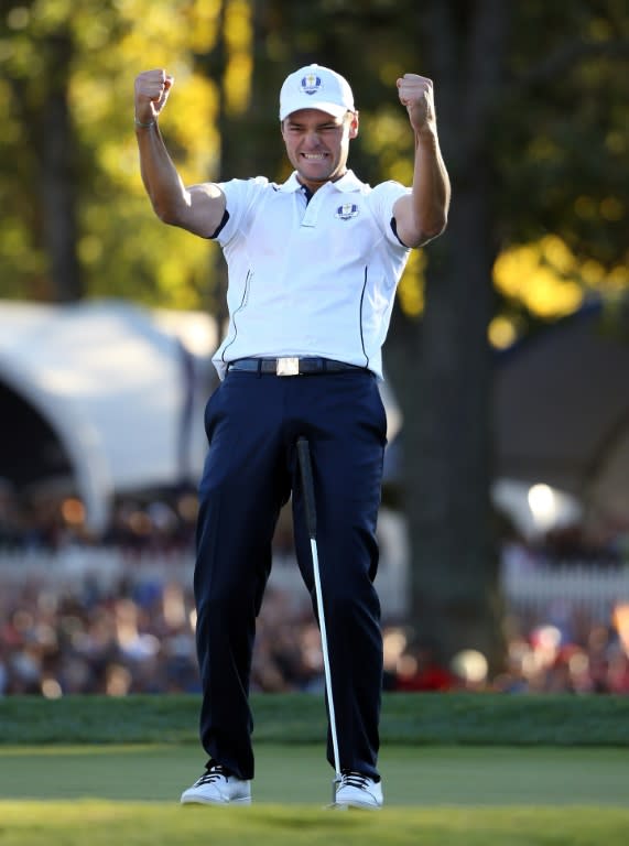 Martin Kaymer of Europe celebrates after making the putt that retained the Ryder Cup on September 30, 2012 in Medinah, Illinois